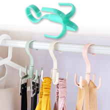 Purse rack for handbags with rotating feature.