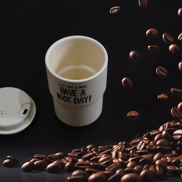 Portable plastic coffee cup with appreciation and motivation design, suitable for travel.